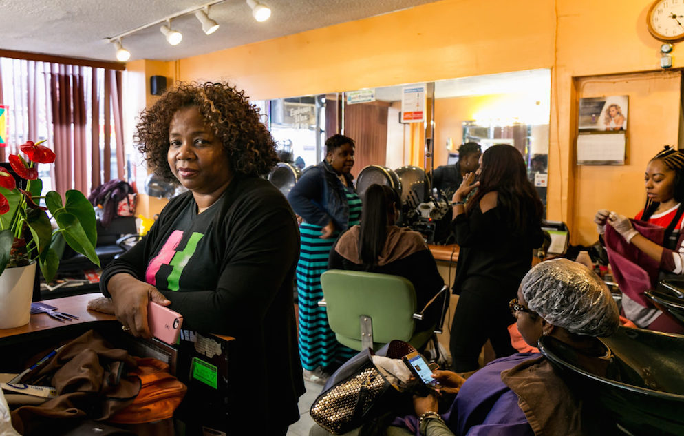 Hermione Fraser, owner and stylist of Hermie's Salon in East Flatbush. A community-health program encouraged Fraser to nudge clients to get mammograms. One did and detected cancer in time for treatment. (Photo by Adi Talwar)