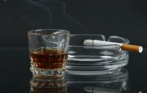 Association between cigarette smoking quit rates and alcohol use disorders