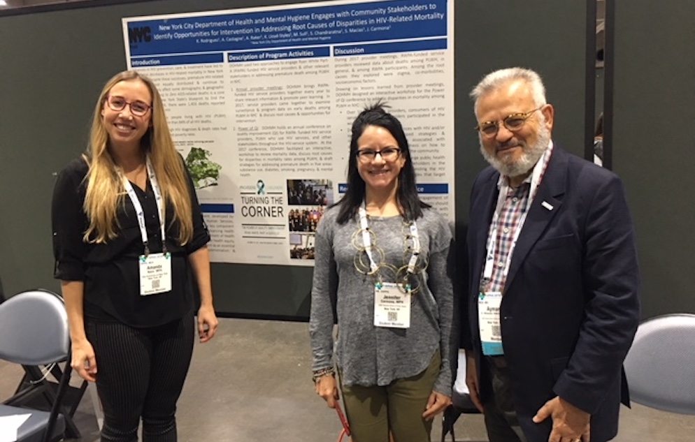 From left to right: CUNY SPH doctoral students Amanda Nace and Jennifer Carmona with Dean Ayman El-Mohandes at APHA