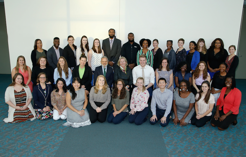 Lyndon Haviland and Ayman El-Mohandes are seated in the middle of this year's group of students that received awards from the Haviland/El-Mohandes Fund to attend APHA