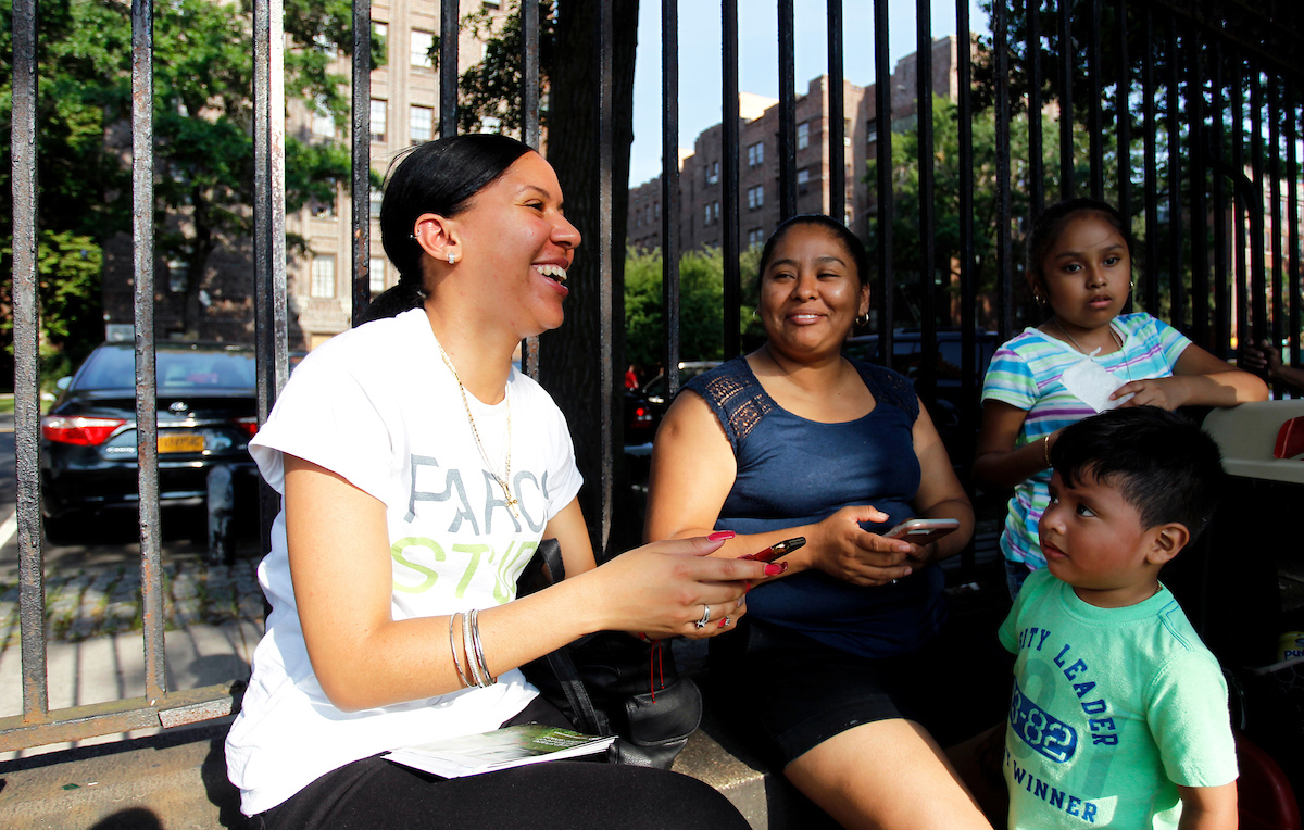 Former PARCS Study Project Manager Geranyi Rodriguez speaks with residents of the Bronx.