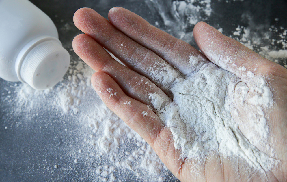 Talcum powder on hands