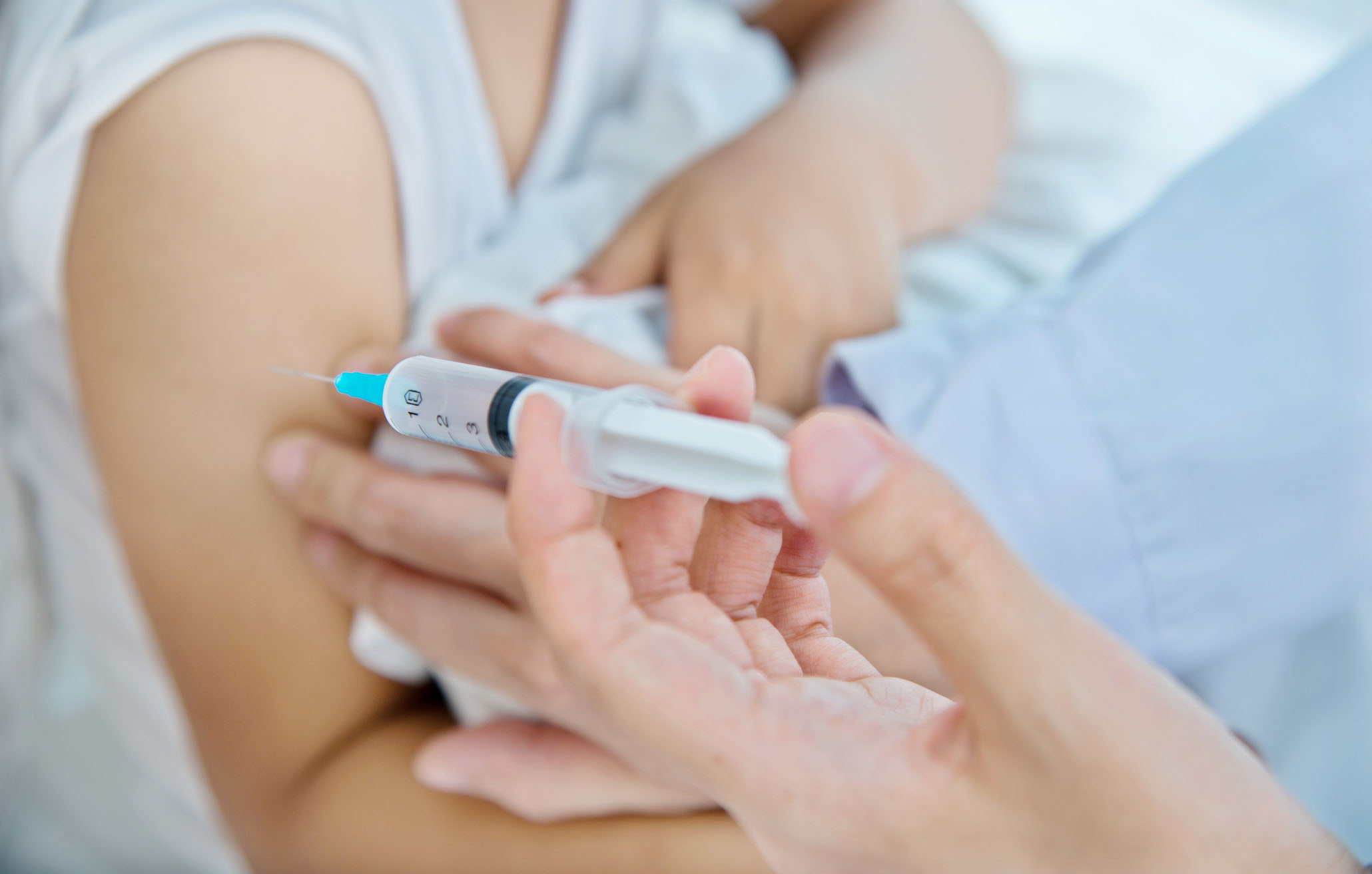 Young boy getting a vaccine