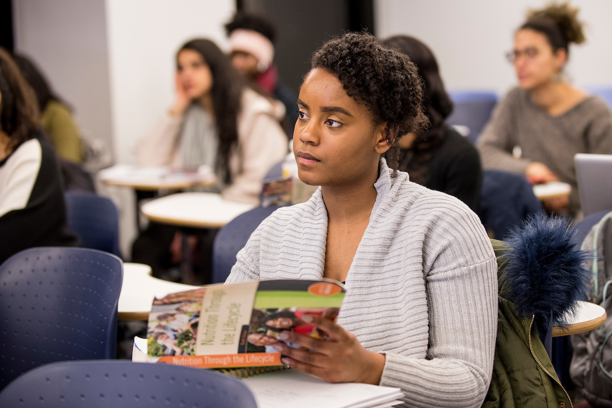 CUNY SPH student listening in class