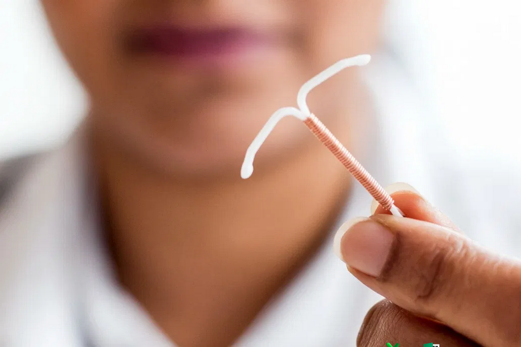 Woman holding iud