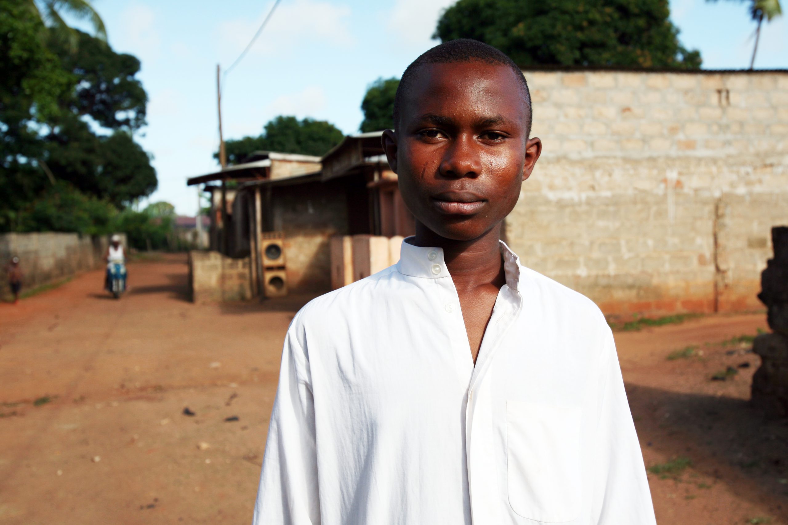 teenage boy in African village
