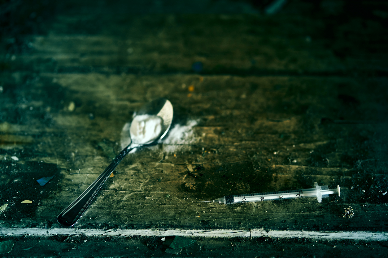 syringe and spoon with drugs
