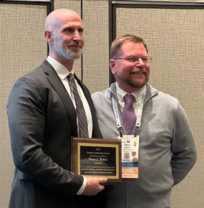Associate Professor Sean Haley presented with APHA Alcohol, Tobacco and Other Drugs Section Leadership Award