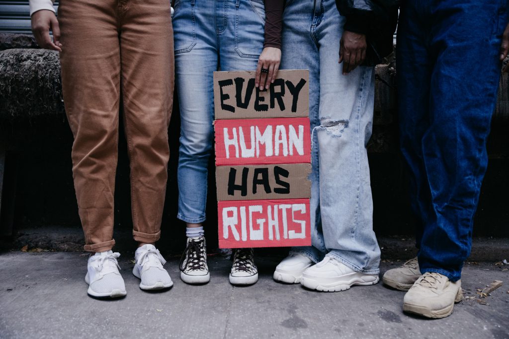 Group holding human rights sign