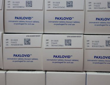 Boxes of Paxlovid in a warehouse