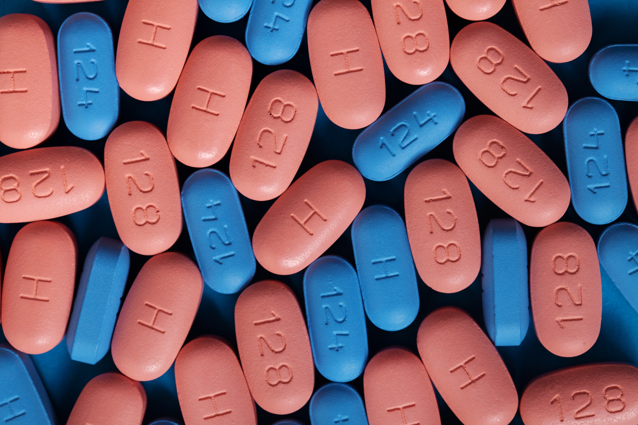 Pink and blue antiretroviral pills