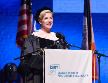 Cecile Richards standing at podium at CUNY SPH commencement