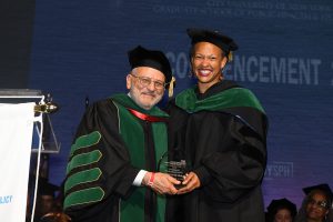 Dr. Michelle Morse is presented with the Public Health Champion Award