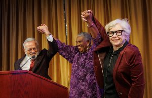 Avery with Dean Ayman El-Mohandes and Associate Dean Terry McGovern
