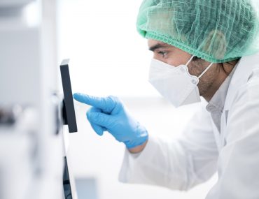 health worker analyzing data