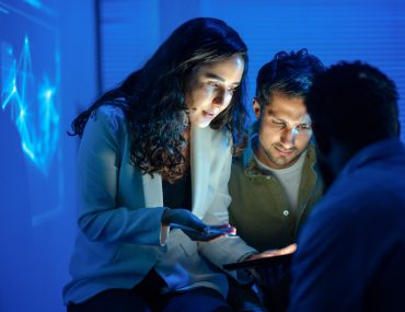 students working on project using AI