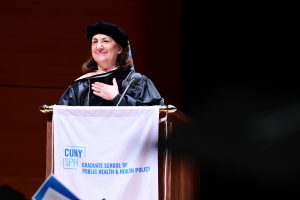 Senior Associate Dean for Administration Susan Klitzman accepts Public Health Champion Award