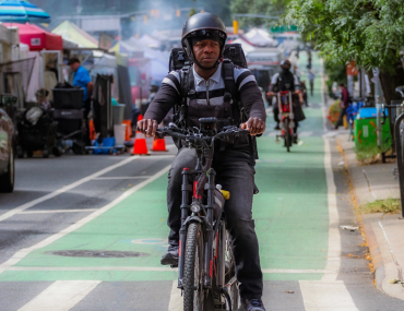delivery worker on bicycle