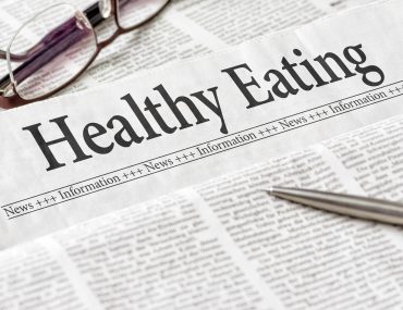 A newspaper with the headline Healthy Eating